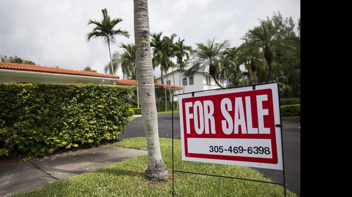 
A sign posted outside a home for sale on Southwest 112th Street in Pinecrest.
