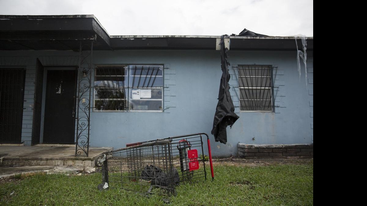 
A foreclosed home on Northwest 17th Street in Homestead on Friday, July 17, 2015.
