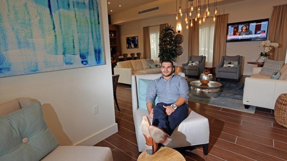 Jordan Galeas visits the luxurious club room at the Soleste Club Prado, a new rental development in West Miami on Southwest 57th Ave. The development offers its tenants many amenities just like you find in the high priced towers on Brickell.