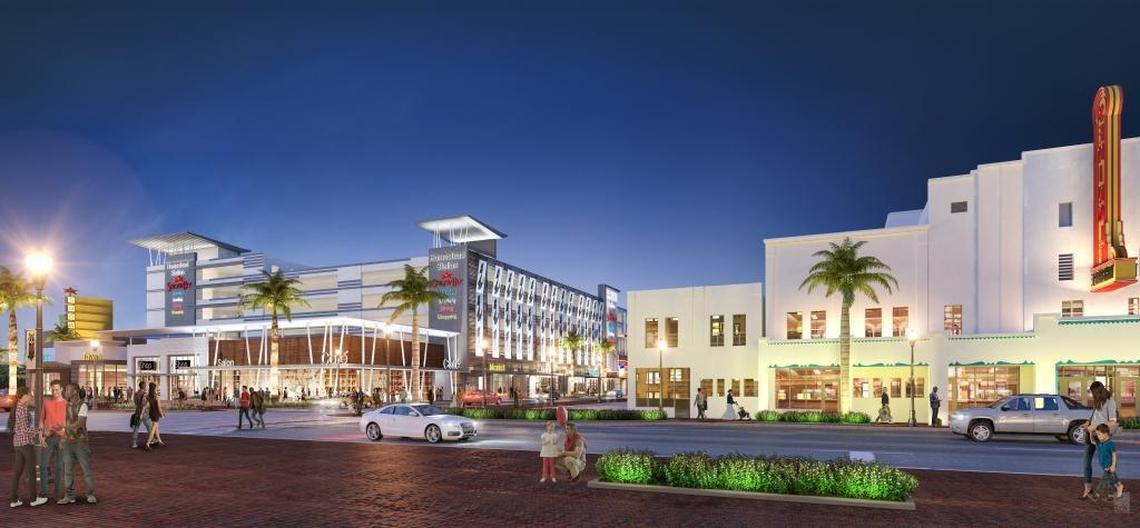 A rendering of the planned Homestead Station project on Krome Avenue in downtown Homestead with the historic, renovated Seminole Theater to the right. The new project will include movie theaters, a bowling alley, shops and restaurants and a parking garage. The complex will also serve as a transit hub linked to the adjacent South Miami-Dade busway, which may be converted to rail or rapid-bus transit.