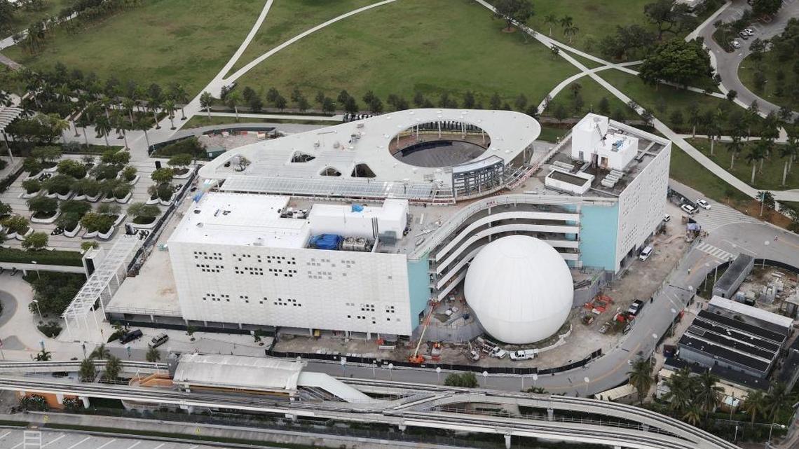Construction workers are scurrying to batten down the Patricia and Phillip Frost Museum of Science job site. Interior exhibit rooms are being used to store equipment and supplies. Anything too big to be brought in was tied down.