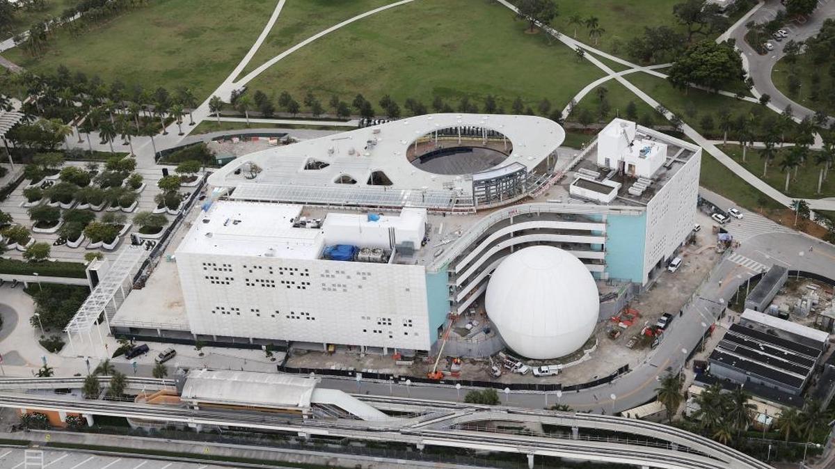 Construction workers are scurrying to batten down the Patricia and Phillip Frost Museum of Science job site. Interior exhibit rooms are being used to store equipment and supplies. Anything too big to be brought in was tied down.