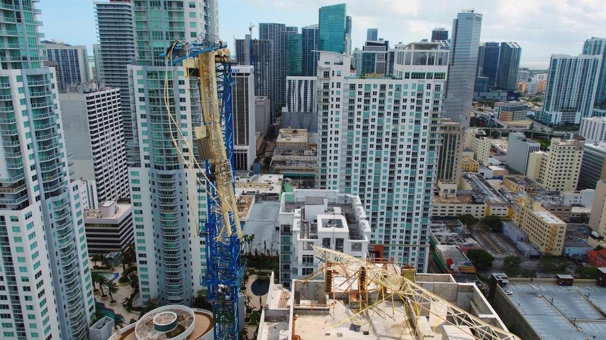 A photo taken Sept. 12, 2017 photo shows a crane damaged by Hurricane Irma in Miami. Part of the crane fell in a bayfront area filled with hotels and high-rise condo and office buildings, near the AmericanAirlines Arena.