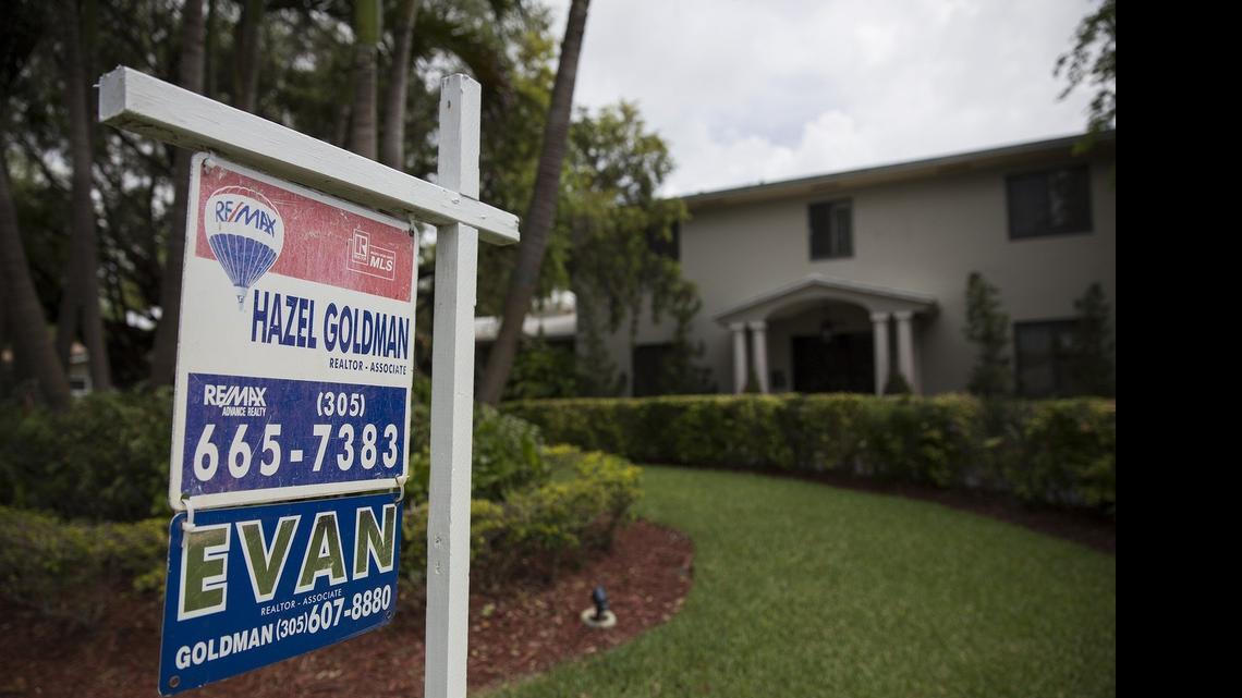 
A sign posted outside a home for sale on Southwest 115th Street in Pinecrest on Wednesday, June 10, 2015.
