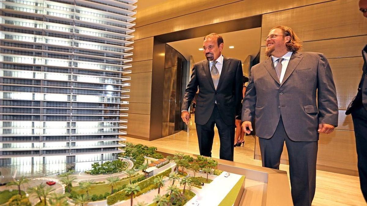 Developers Jorge Perez and Gil Dezer, with the scale model of Residences by Armania Casa in Sunny Isles Beach, January 21, 2016. The project sales center was unveiled with the sales center built to accomodate examples of the living area of the units.