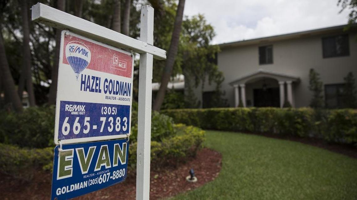 
A sign posted outside a home for sale on Southwest115th Street in Pinecrest on Wednesday, June 10, 2015.

