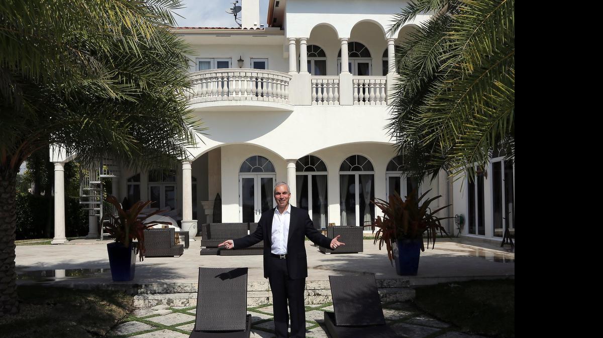 
Luxury home broker Mark Zilbert tours a Palm Island mansion that was up for sale for $23.4 million on in 2013.
