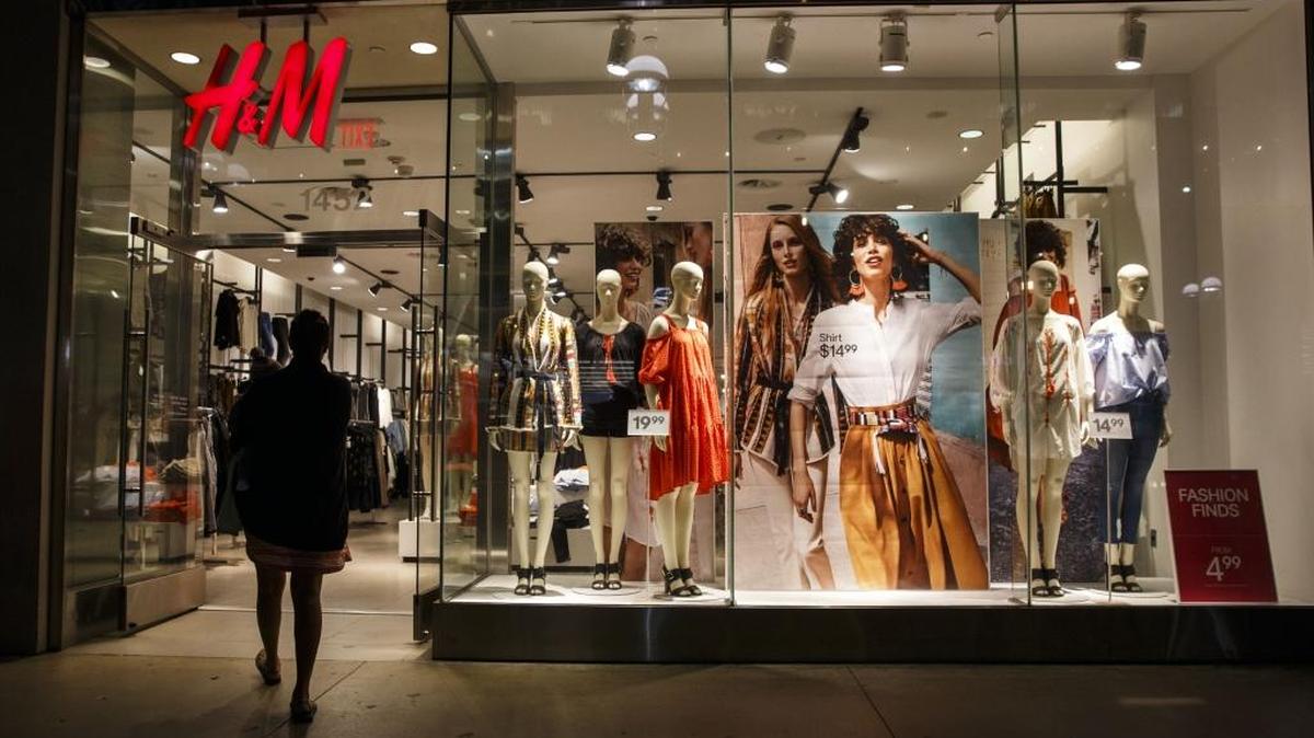 A shopper enters an Hennes & Mauritz AB (H&M) store at the Third Street Promenade in Santa Monica, California.