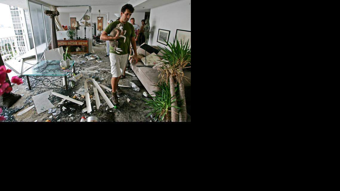 
Daniel Sanchez surveys the damage to his condo unit at Grandview Palace on North Bay Village after Hurricane Wilma in October 2005.
