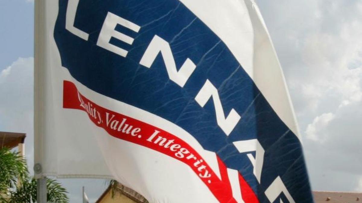 A file photo shows a Lennar company flag flying outside a townhome community in Doral.