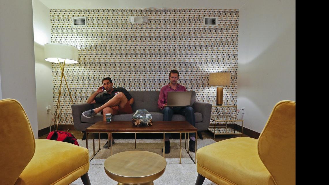 
Jonathan Strauss and Steven Quayle work at Buro MiMo, a new co-working space opening up in northeast Miami. Quayle of 3Floorsup is helping Strauss, who owns Skateboard Supercross, with some work on his digital platform. Buro MiMo has a retro-chic design to reflect its historic MiMo neighborhood of ‘50s architecture.
