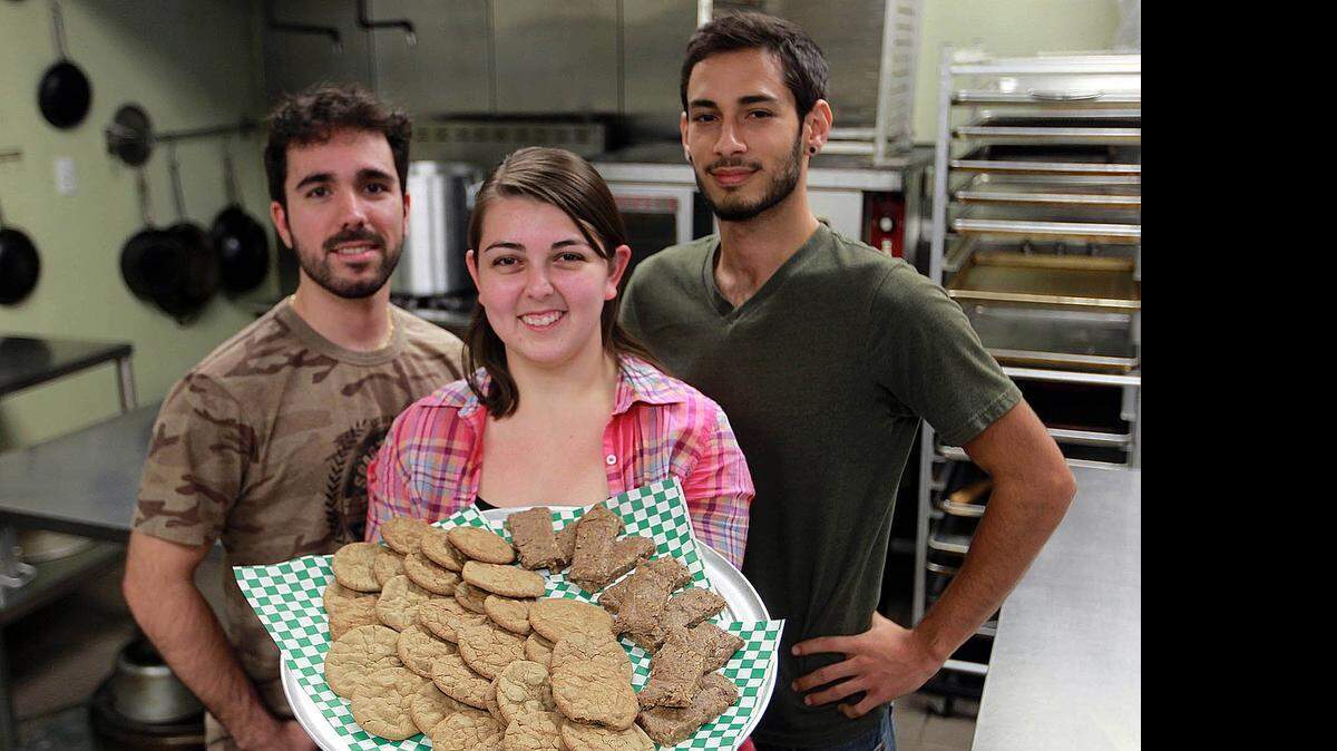 <cutline_leadin>FIU Students:</cutline_leadin> To provide a cheaper protein alternative, Nicolezander Garza, left, Valerie Yoda, and Ricardo Delgado have created the insect-based food-product company Senzu Foods.<137> Their goal is to make protein bars and other recipes with different insects for a cheaper alternative to protein.<137><252><137>are finalist in the Herald's Business Plan Competition. Their plan is to make protein bars and other recipes with different insects for a cheaper alternative to protein, Wednesday, April 15, 2015.<252>After some experimenting, seniors Nicolezander Garza, Valerie Yoda and Ricardo Delgado have created the insect-based food product company Senzu. <252><137>