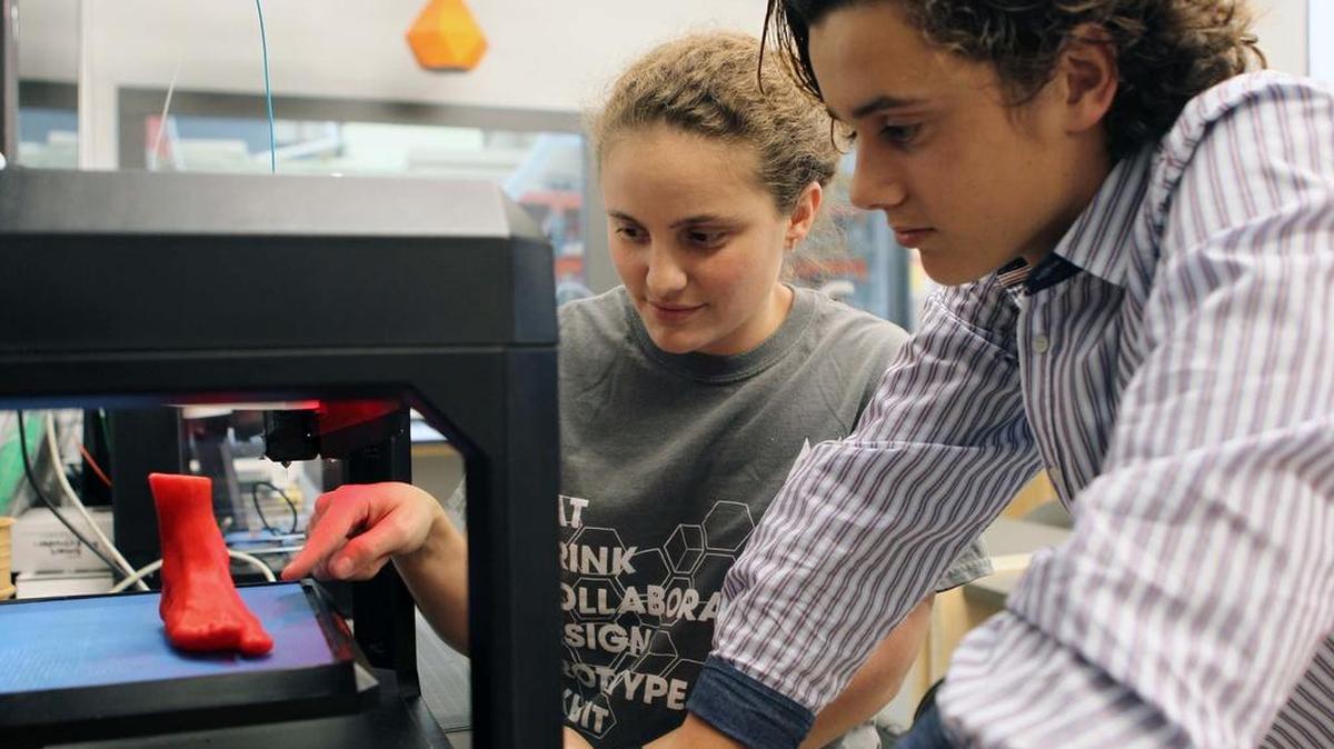 High school student Marco Fernandez, right, with makerspace co-founder Daisy Nodal work together at Moonlighter Makerspace in Wynwood.