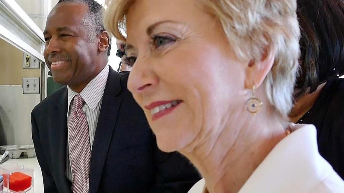 U.S. Small Business Administrator Linda McMahon and HUD Secretary Dr. Ben Carson share a laugh at the cafe bar at Versailles Cuban restaurant in Miami. After the gathering with Carson, she headed to the SBA offices to meet with small businesses.