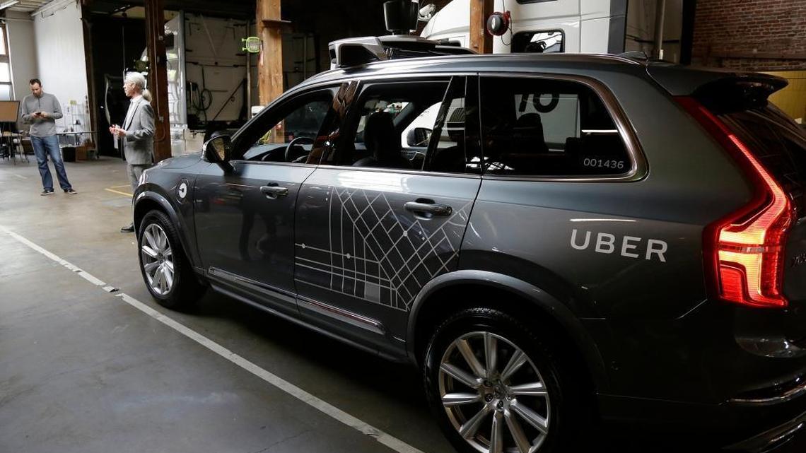 An Uber driverless car is displayed in a garage in San Francisco in 2016. Uber suspended all of its self-driving testing Monday, March 19, 2018, after what is believed to be the first fatal pedestrian crash involving the vehicles.
