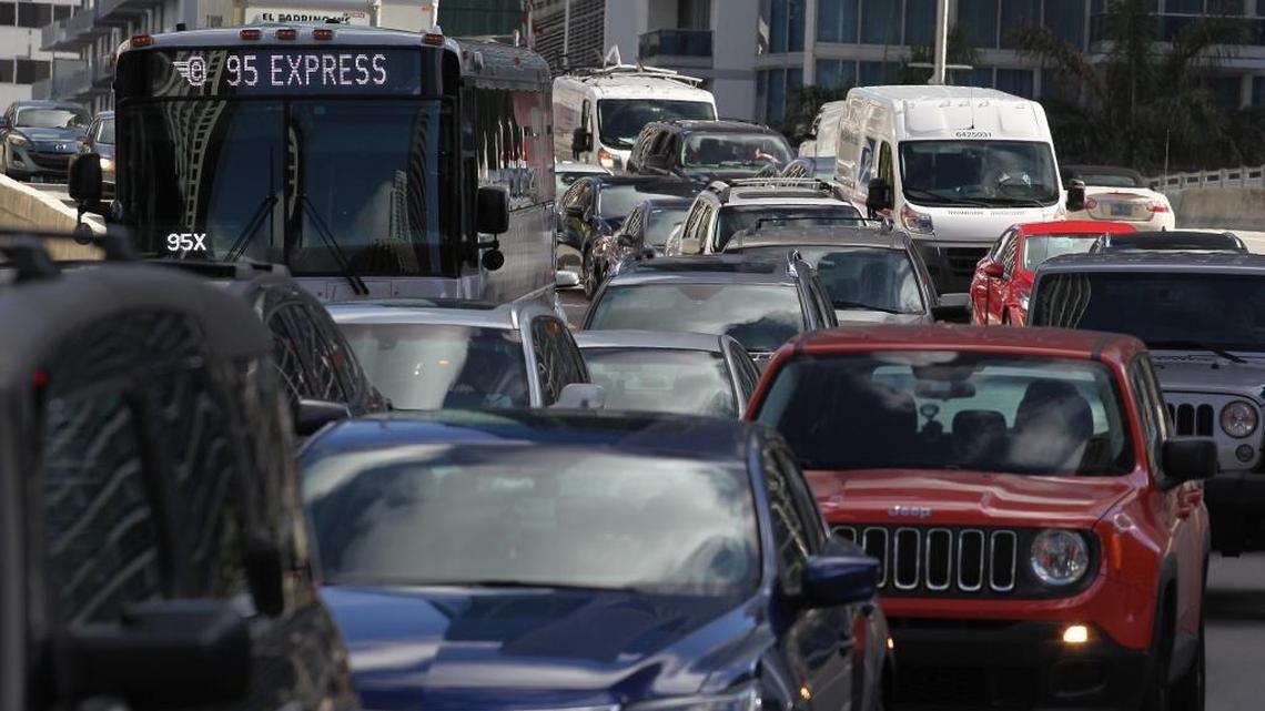 Traffic crawls along in downtown Miami.