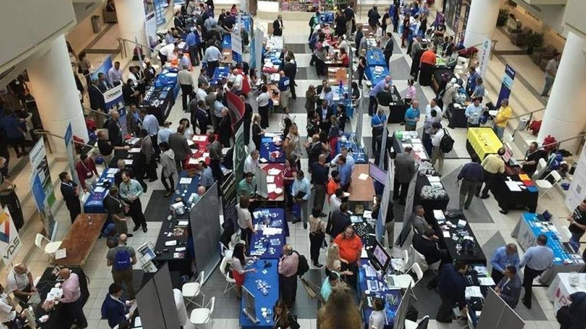 Employers and potential employees mingle at ITPalooza’s expo area at Nova Southeastern University in 2015. ITPalooza, a conference with speakers, panel discussions, a hiring fair and a party, is returning to South Florida for a fifth year. It will be Dec. 8 at Signature Grand in Davie.