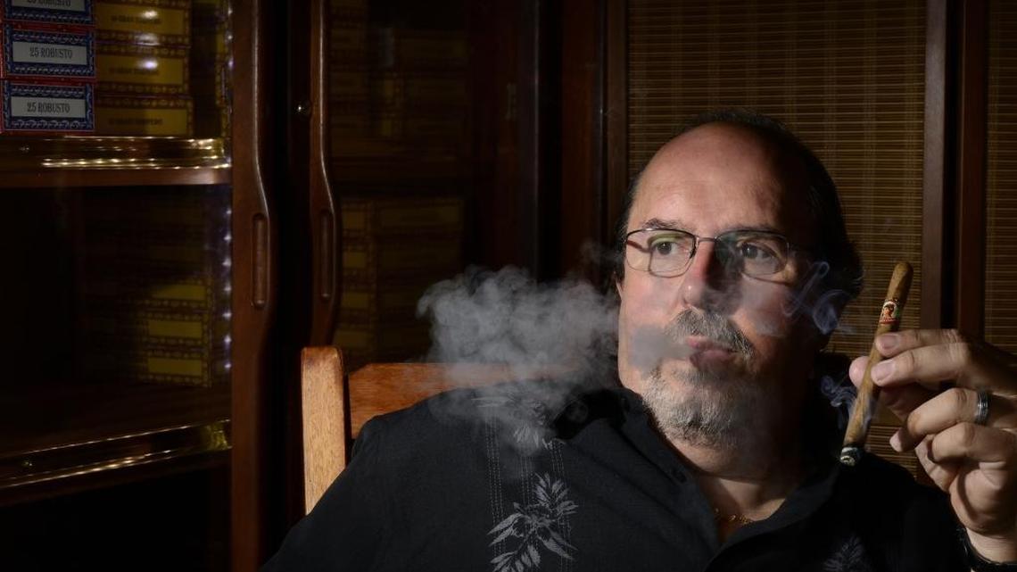 Luis M. Sanchez, also known as The Mad Scientist, sits in his cigar shop La Tradition Cubana on July 7, 2016. New FDA regulations will have an impact on Miami's cigar producers in the coming months and years.
