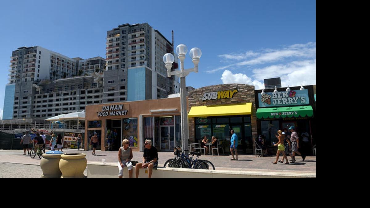 
The Margaritaville Hollywood Beach Resort towers over shops along the Broadwalk in Hollywood. 
