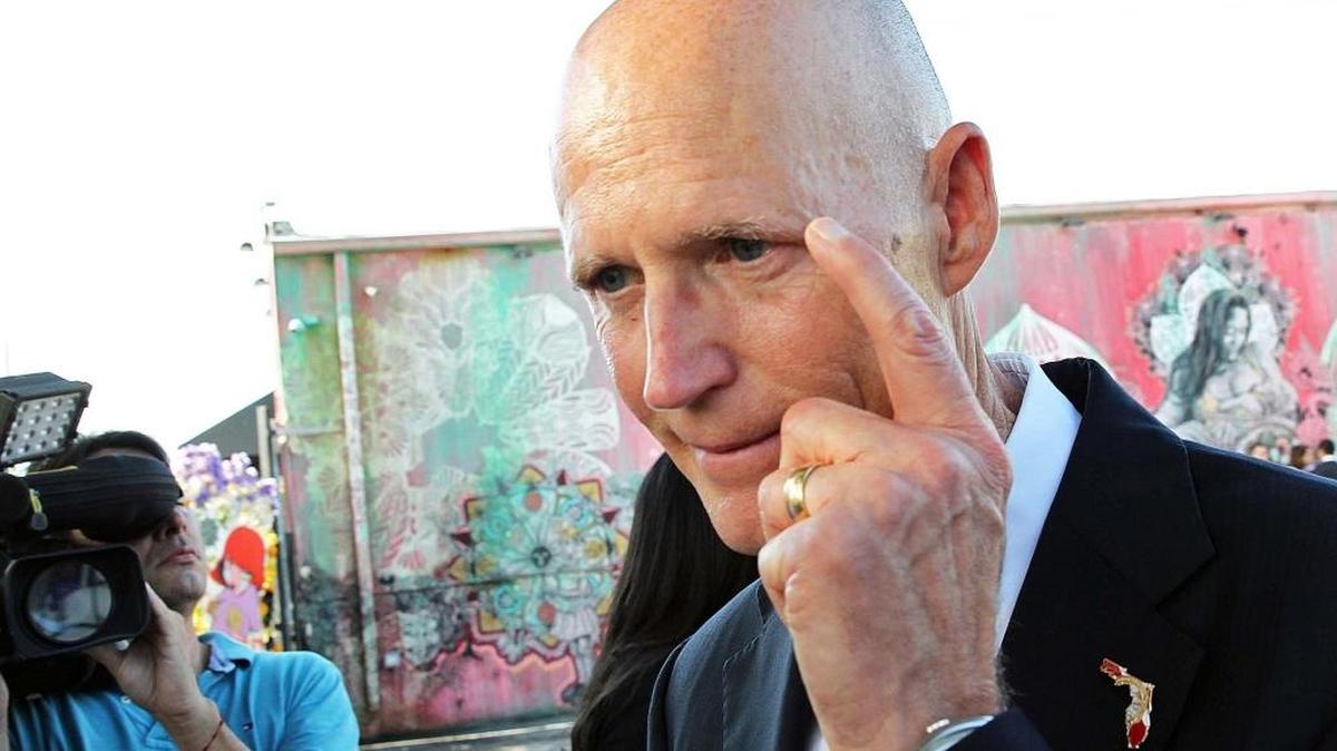 Florida Gov. Rick Scott answers reporters’ questions at Wynwood Walls after announcing that Wynwood is Zika free on Monday September 19, 2016