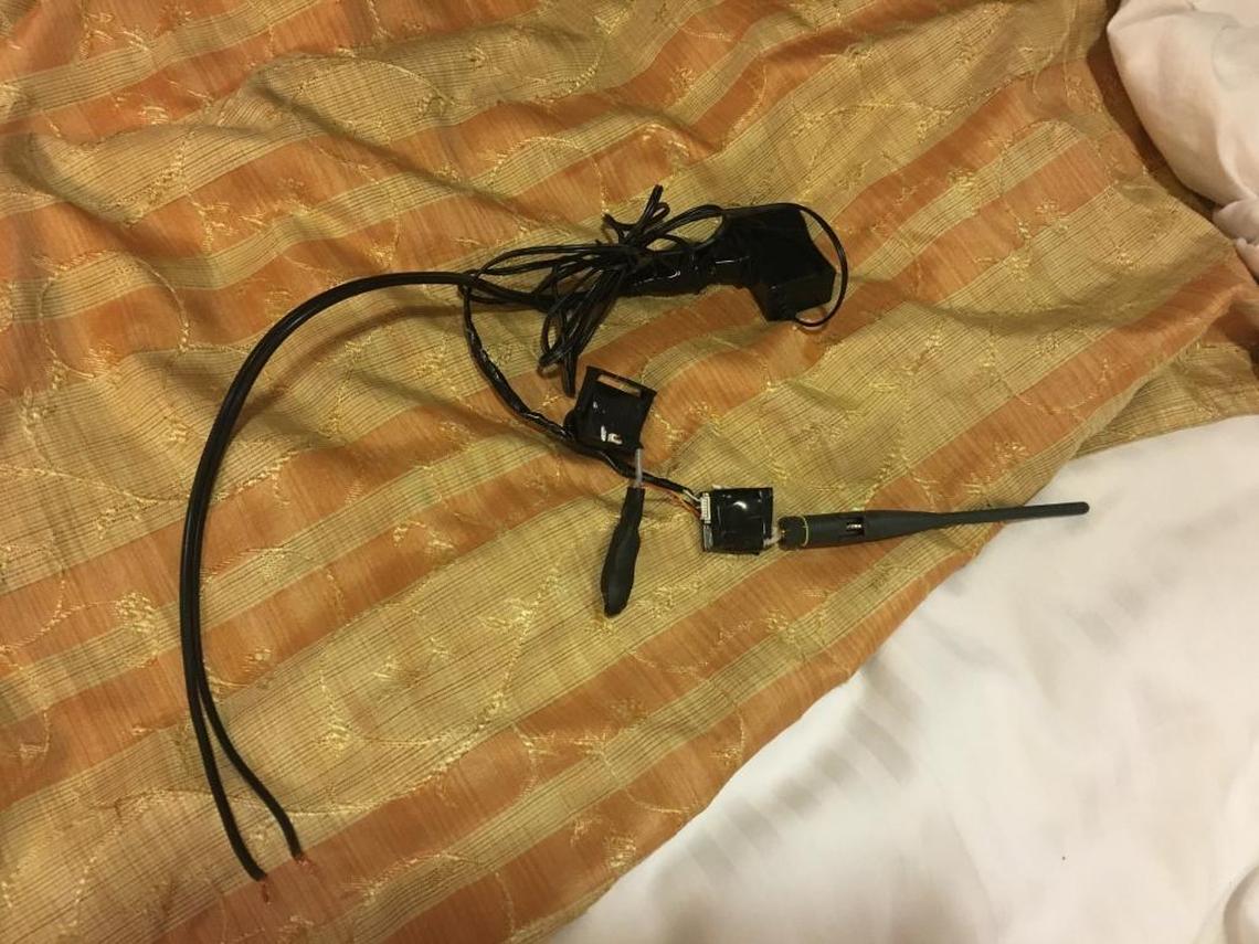 The camera and transmitter a Florida family found behind their TV on the Carnival Fantasy in October.