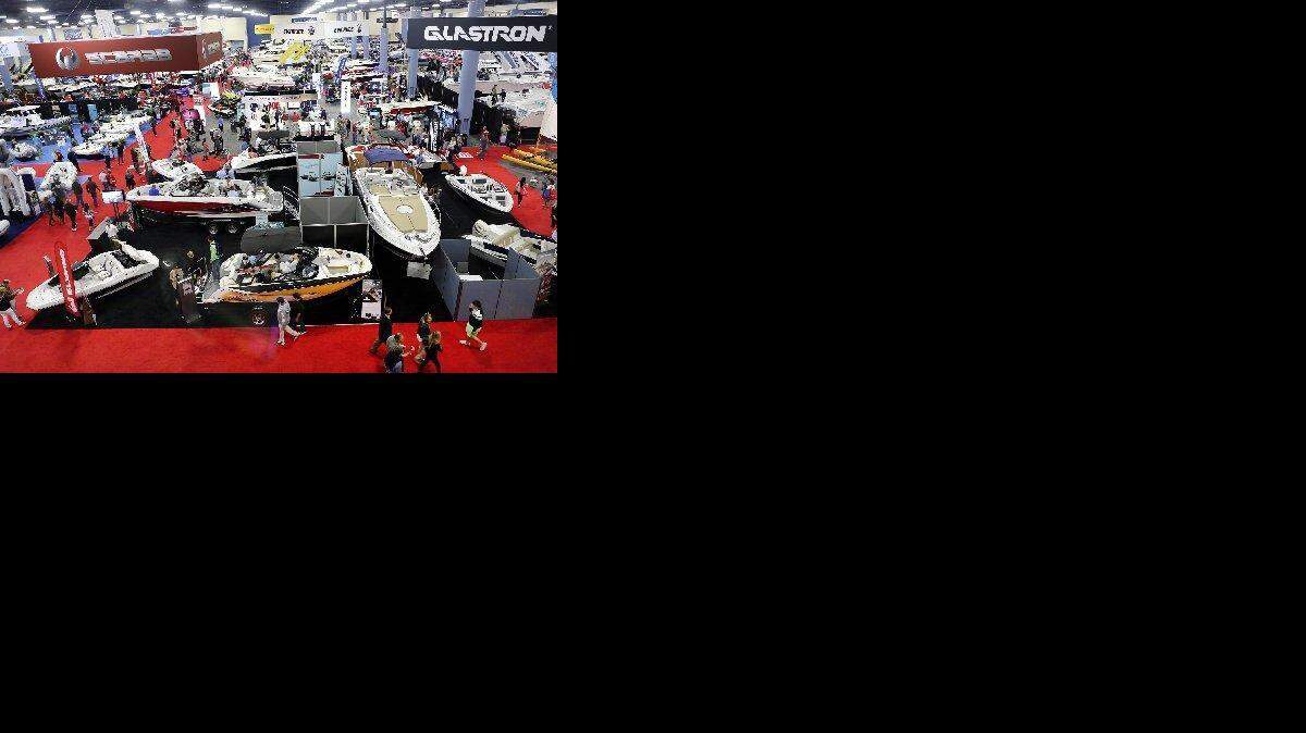 
Boating enthusiasts explore the Progressive Miami International Boat Show and Strictly Sail, at the Miami Beach Convention Center on Saturday, Feb. 14, 2015. 
