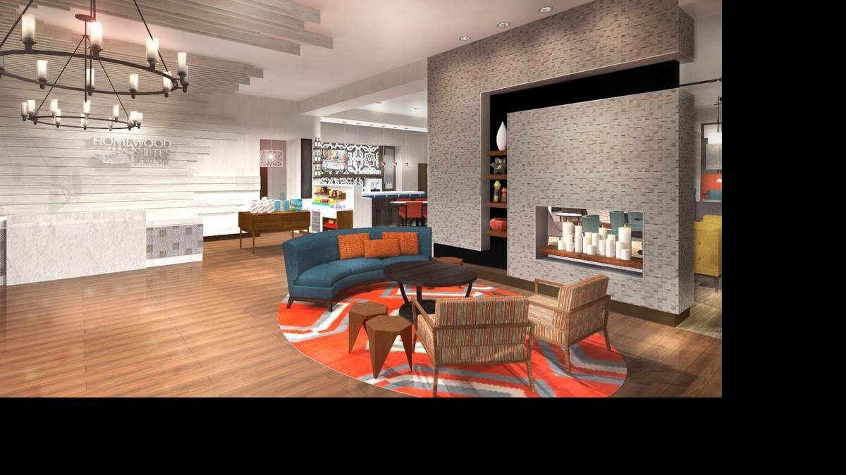 
This rendering shows the front desk area for a Homewood Suites in Latin America.
