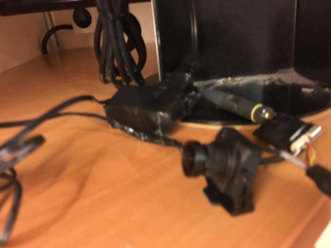 The camera and transmitter a Florida family found behind their TV on the Carnival Fantasy in October.