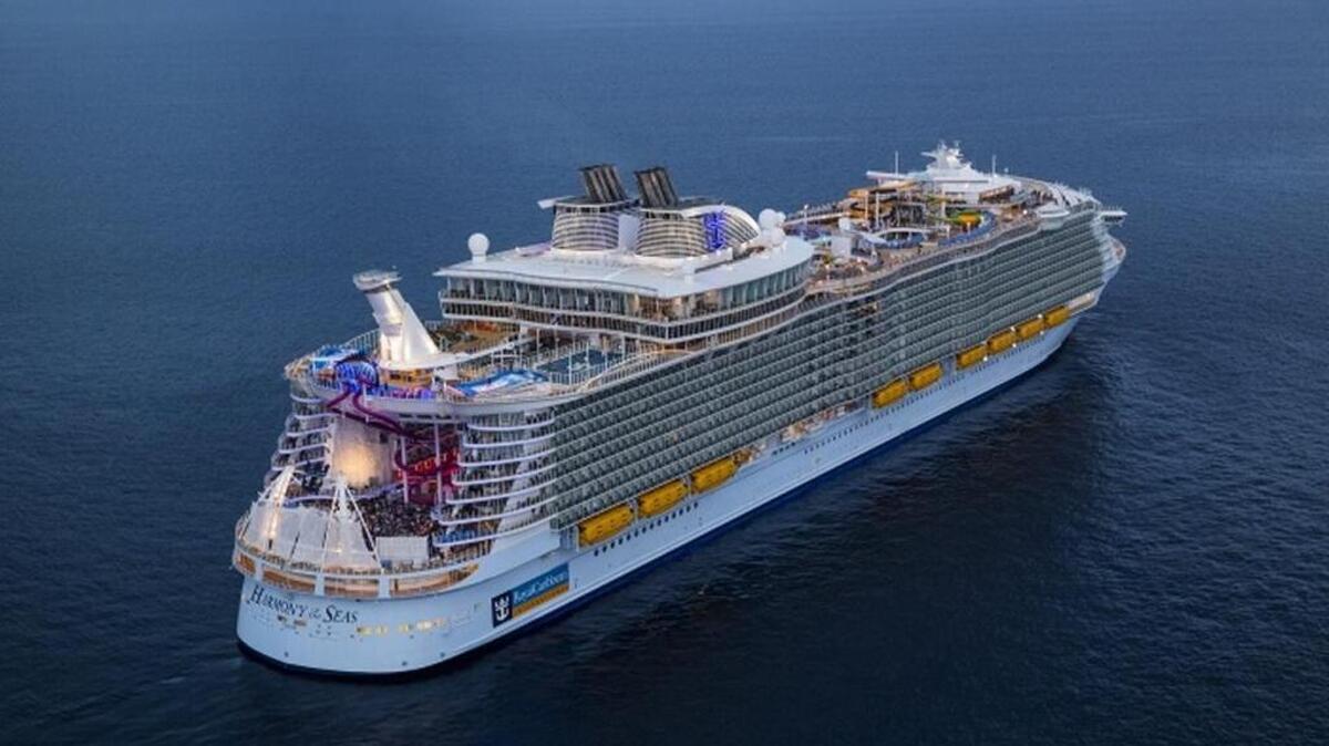 Royal Caribbean International’s 6,780-passenger Harmony of the Seas. The cruise line is holding a contest to name a South Florida teacher godmother of the largest ship in the world.