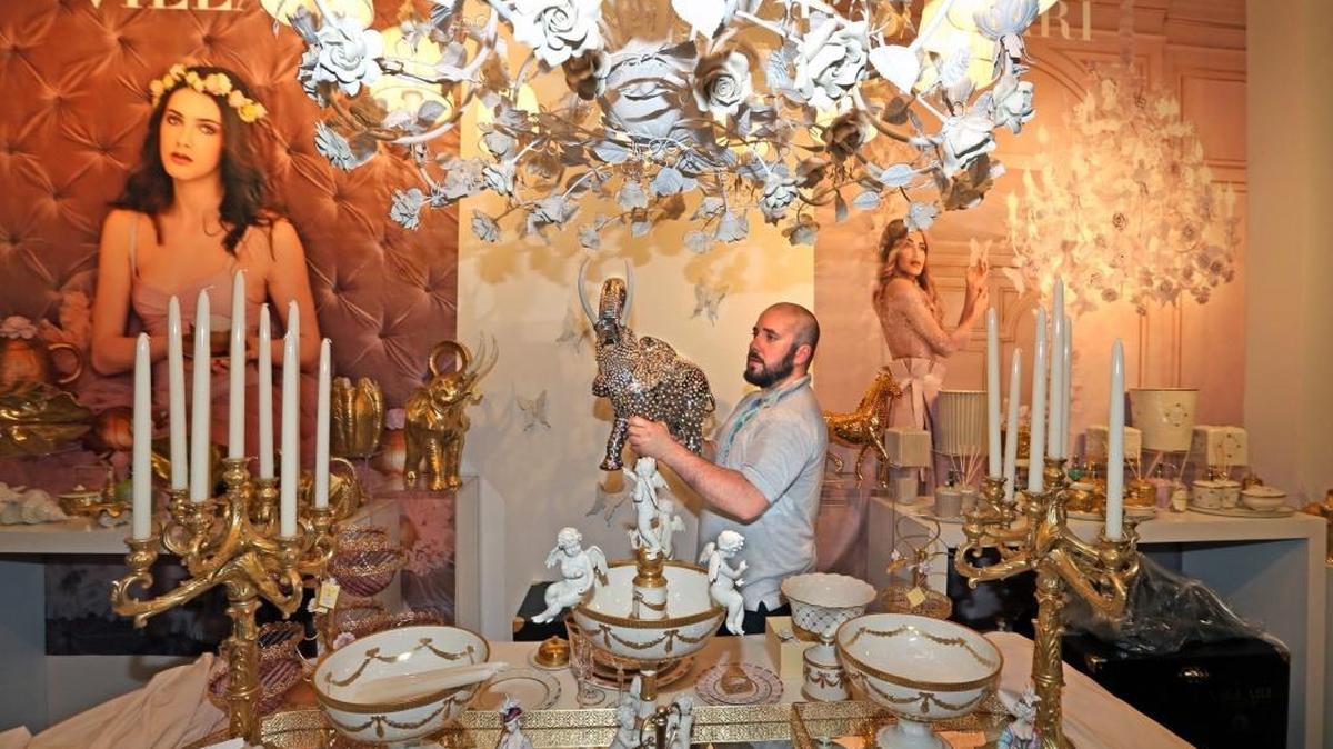 Leone Villari holds a $41,000 elephant sculpture as he preapre his VILLARI exhibit at Maison & Objects Americas show at the Miami Beach Convention Center in 2015. The fair announced that it won’t be back in 2017 or 2018.