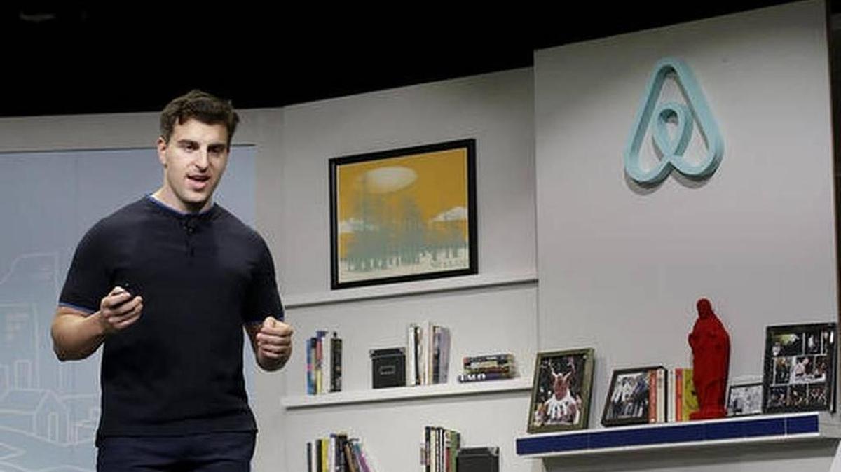 Airbnb co-founder and CEO Brian Chesky speaks in San Francisco on April 19. In Miami, the service is under scrutiny from hoteliers who feel the business should be regulated in the same way hotels are.