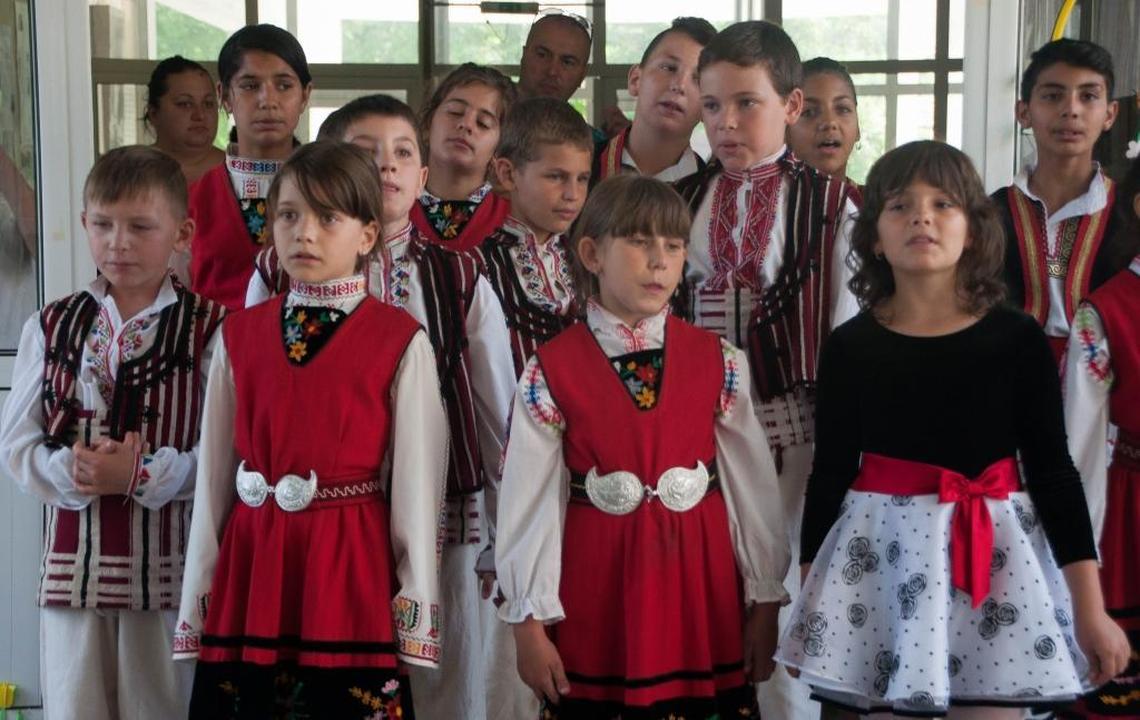 School children in a Bulgarian village entertain guests aboard a Scenic river cruise, 2016.