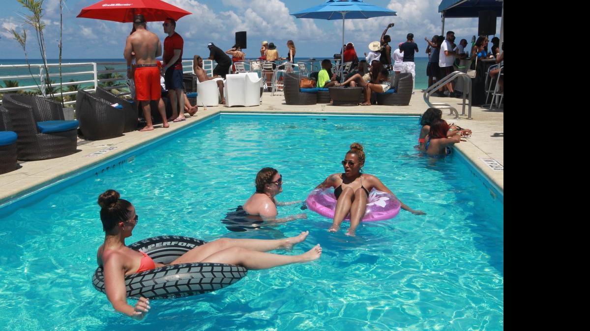 
Hotel occupancy was down in South Florida last month, but demand and room rates increased. In this photo from Memorial Day weekend, guests lounge in the pool at the Congress Hotel in Miami Beach.

