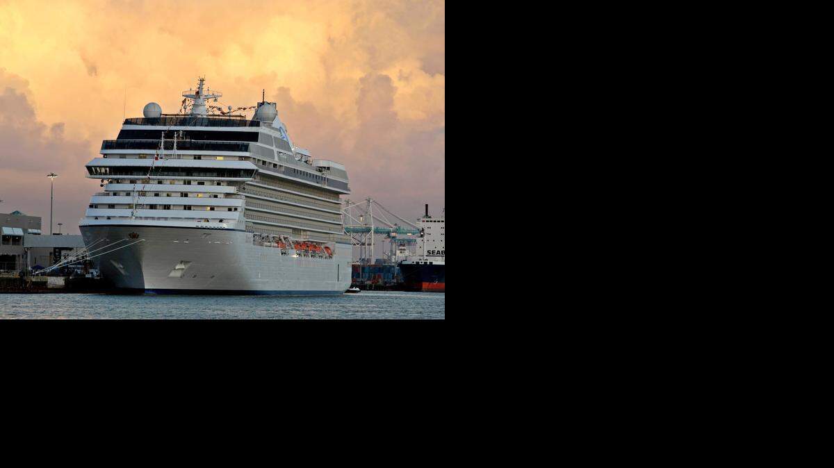 
Oceania Cruises' new ship, Marina, is shown docked at the Port of Miami in this file photo. The upper-premium line was acquired by Norwegian Cruise Line Holdings. (Al Diaz/Miami Herald/MCT)
