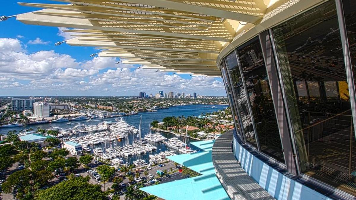 The view from the Hyatt Regency Pier Sixty-Six Resort and Marina’s top-floor rotating event space. The marina, seen on the left, is a major part of the hotel’s expected $200 million price tag.