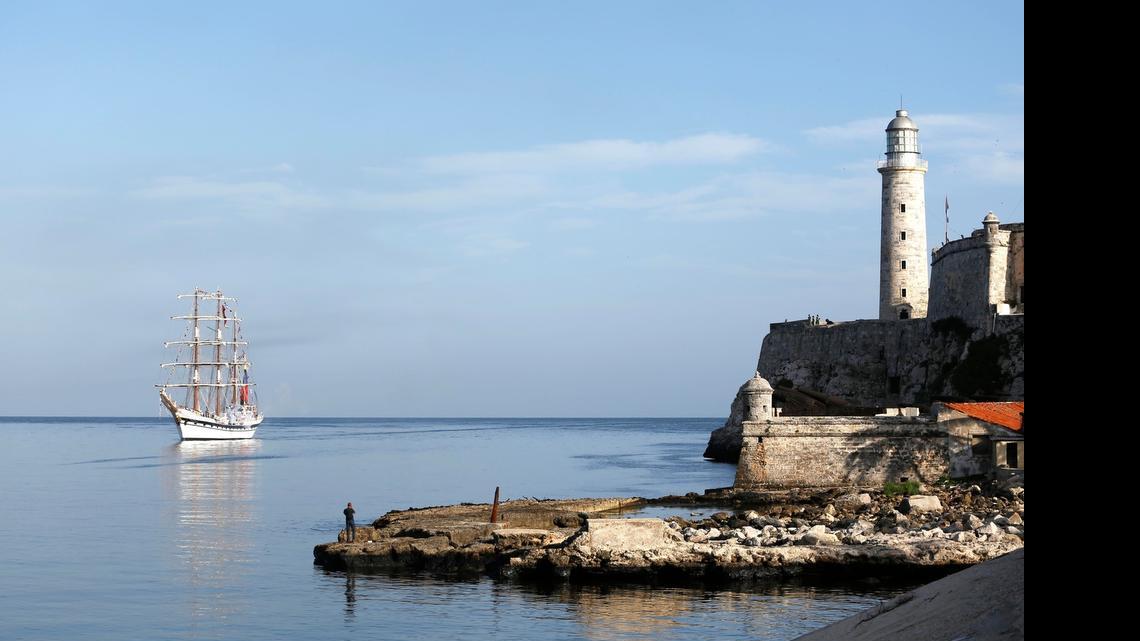 
Carnival Corporation’s fathom brand has received U.S. approval to sail to Cuba. In this recent photo, Venezuela's Simon Bolivar school sailing ship sails to Havana Harbor where the Morro Cabana fortress lighthouse stands in Havana, Cuba. 
