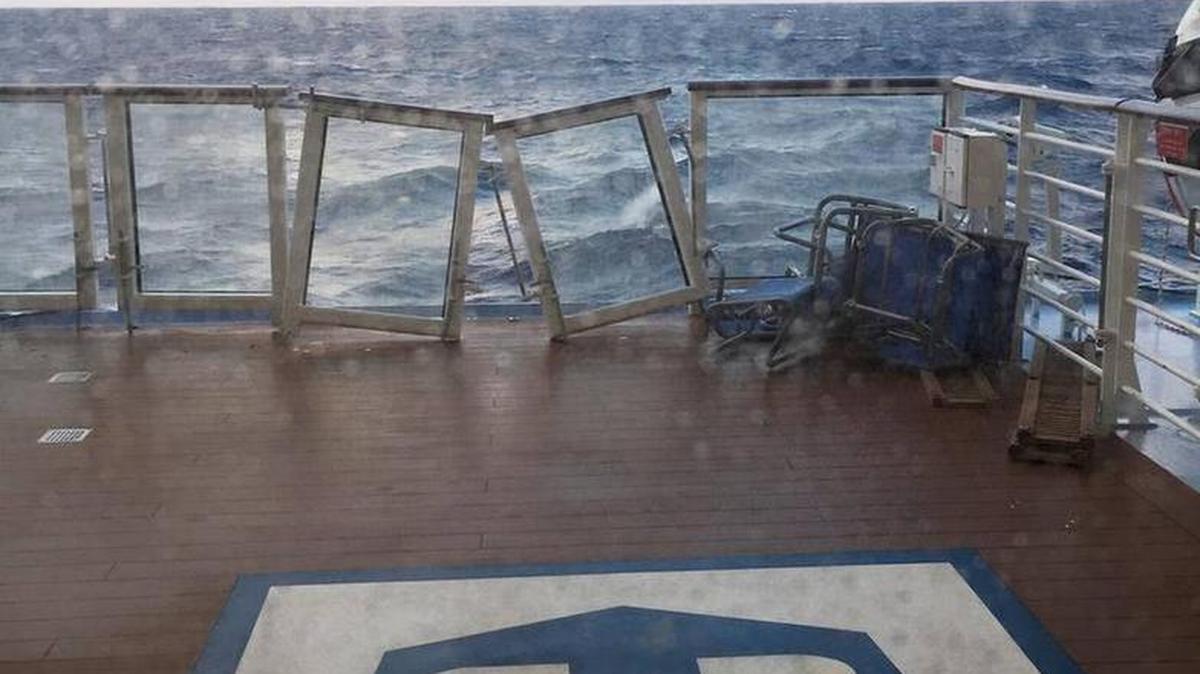 Damage to the deck of Royal Caribbean's ship Anthem of the Seas. The ship ran into high winds and rough seas in the Atlantic Ocean, forcing passengers into their cabins overnight. Passenger Bruce Simpson is suing the cruise line for negligence, saying it knowingly sailed into the storm.