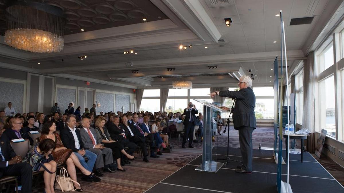 William D. Talbert, III, president and CEO of the Greater Miami Convention & Visitors Bureau discusses another record year for Miami tourism at the Rusty Pelican restaurant in Key Biscayne.