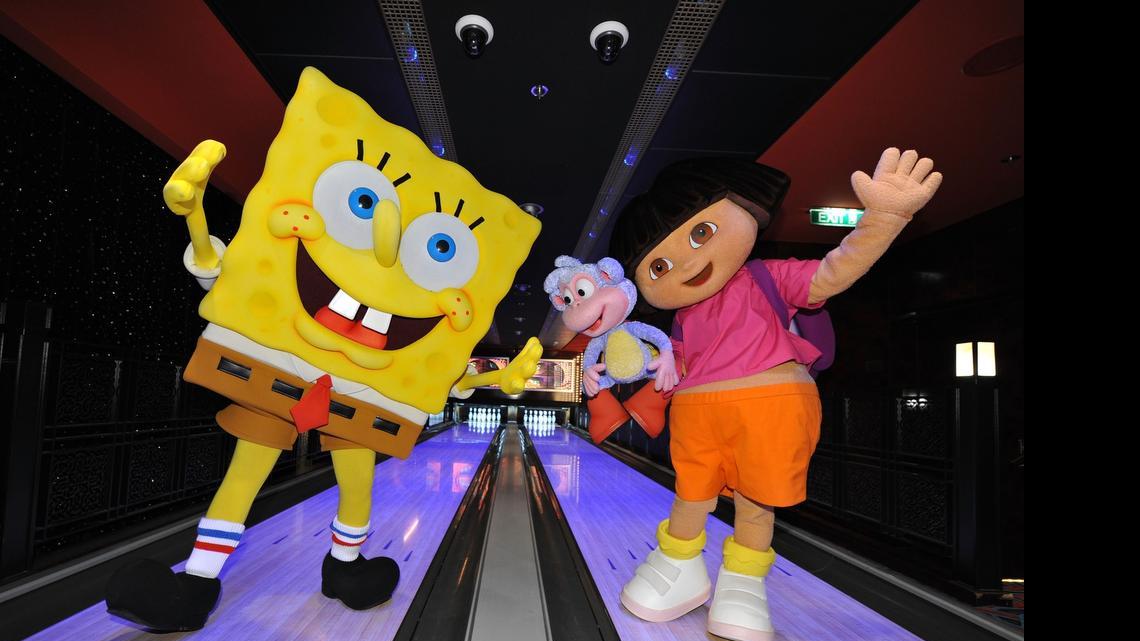 
SpongeBob SquarePants and Dora the Explorer bowl on one of Norwegian Cruise Line’s signature bowling alleys at a press conference to announce Nickelodeon at Sea, a partnership between Nickelodeon and Norwegian Cruise Line, in 2010. The partnership is ending this year, Norwegian announced. 
