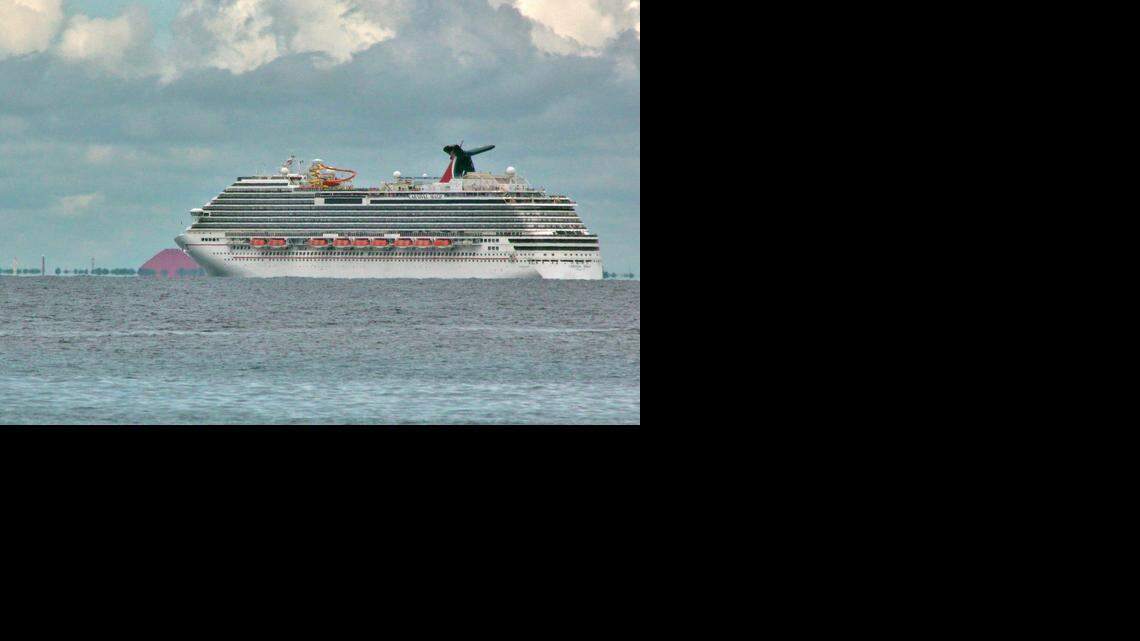 
The Carnival Magic waits off the coast of Cozumel to dock Friday morning. The cruise line decided to send the ship back to its home port in Galveston when it was discovered it was carrying a health care worker who may have handled lab samples from the deceased Ebola-infected man in Dallas.
