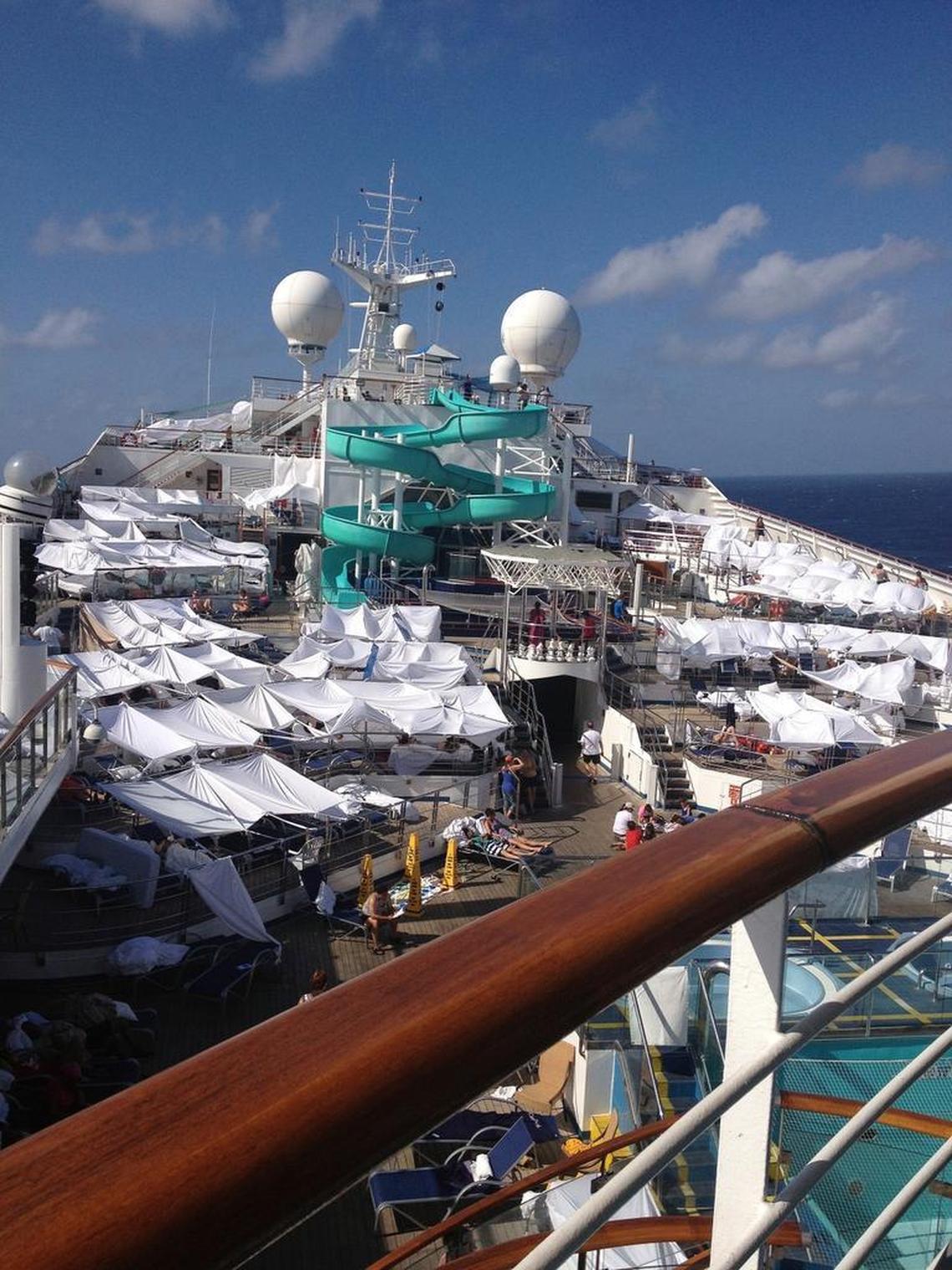 This 2013 passenger photo shows the tent city built on the Lido deck of the Carnival Triumph for people to escape the stench from the lower decks of the disabled ship. The Triumph arrived late Feb. 14, 2013, in Mobile, Ala., several days after an engine-room fire left the ship powerless off Mexico.