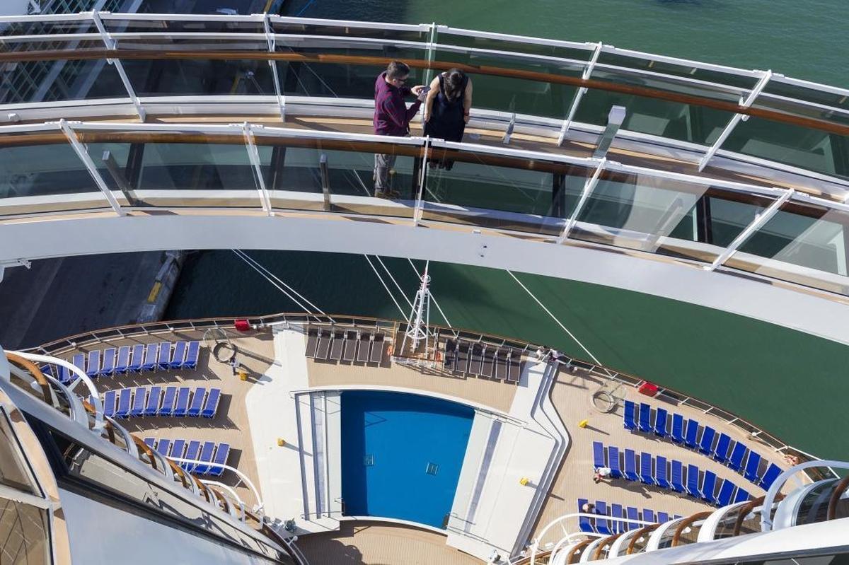 Jorge Jimenez, 43, and his wife, Yomari Jimenez, 38, walk across the "Bridge of Sighs" on MSC Cruises' newest ship, Seaside.
