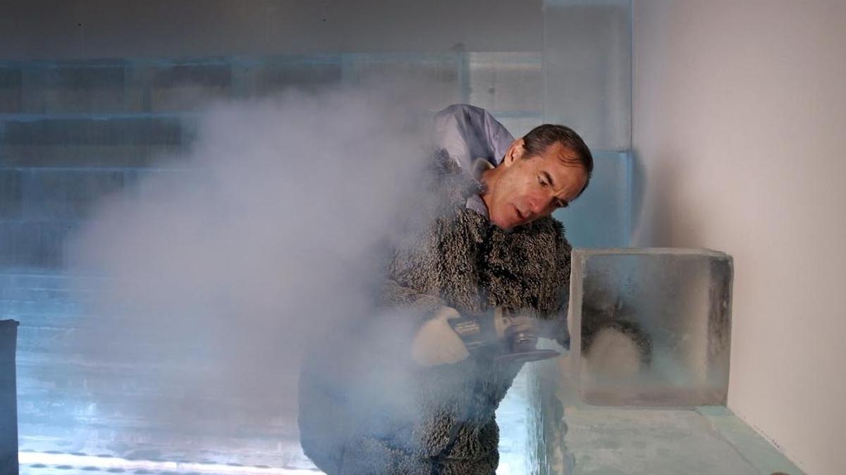 
David Berman puts sculpting touches on blocks of ice inside Drinkhouse Fire & Ice in this July photo. 
