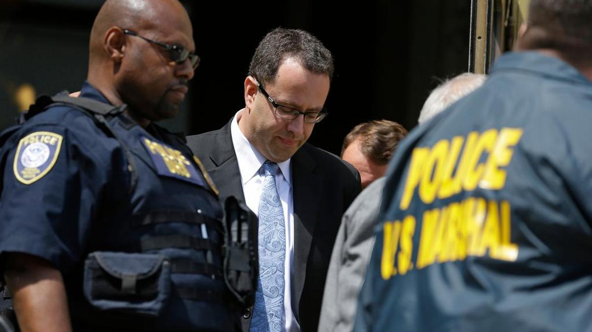 
Former Subway pitch man Jared Fogle leaves the federal courthouse in Indianapolis, Wednesday, Aug. 19, 2015 following a hearing on child-pornography charges. Fogle agreed to plead guilty to allegations that he paid for sex acts with minors and received child pornography in a case that destroyed his career at the sandwich-shop chain and could send him to prison for more than a decade.
