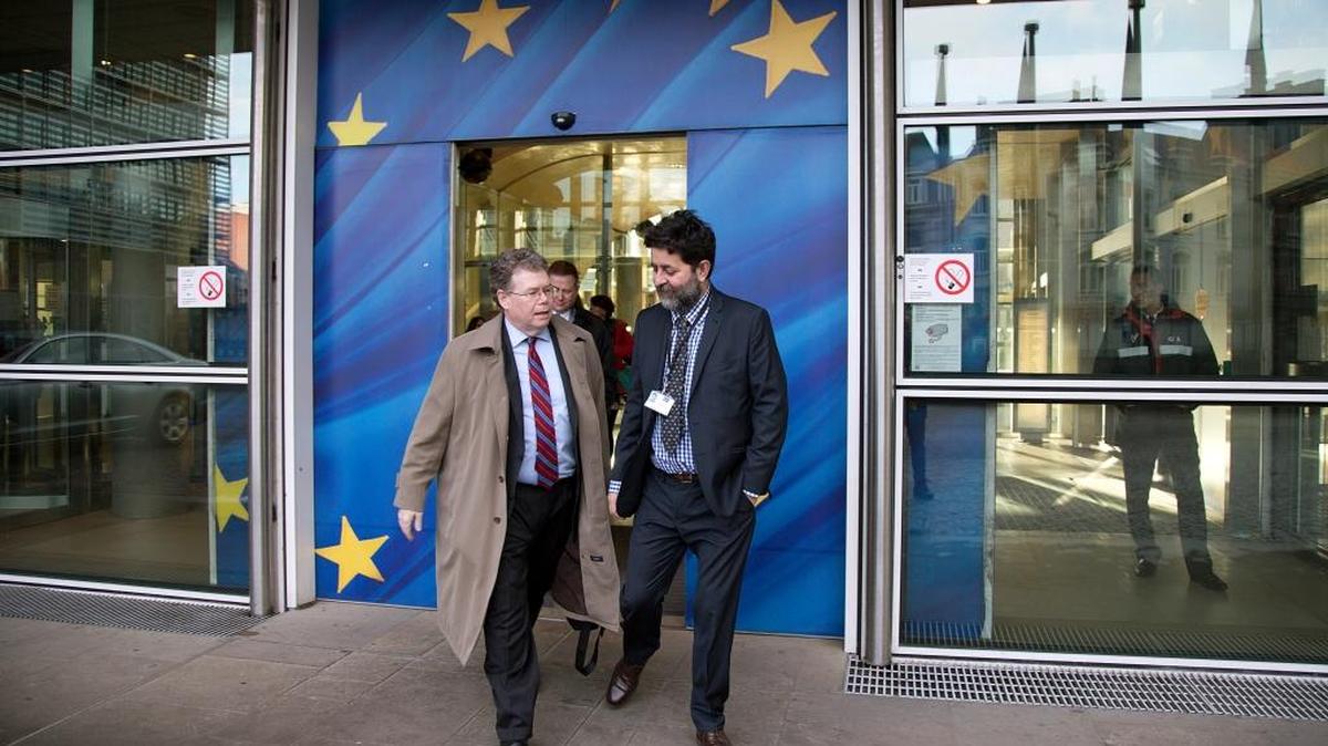 U.S. chief trade negotiator Dan Mullaney, left, and EU Chief trade negotiator Ignacio Garcia Bercero, right, walk together out of EU headquarters in Brussels on Monday, Feb. 2, 2015. The EU and US negotiators on Monday begin the 8th round of the Transatlantic Trade and Investment Partnership (TTIP). The two are in Miami until Friday to continue trade talks.
