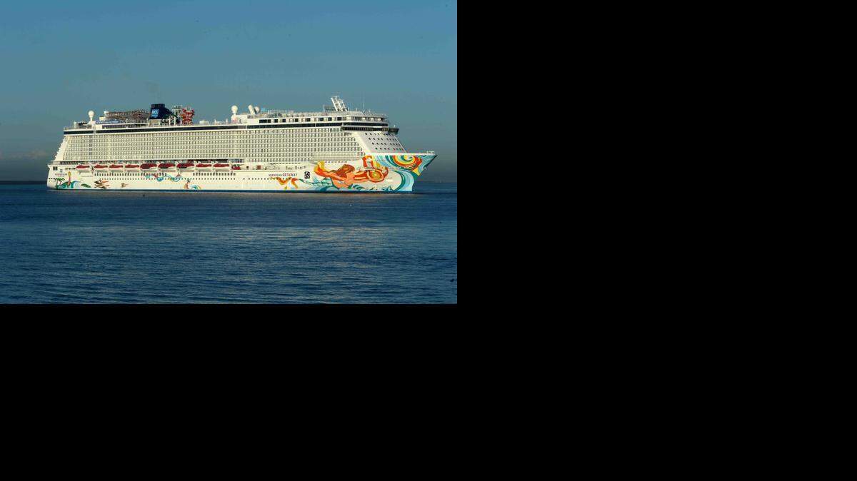 
Norwegian Cruise Line Holdings reported improved third-quarter earnings on Wednesday. The company welcomed Norwegian Getaway, shown in this file photo, in January.
