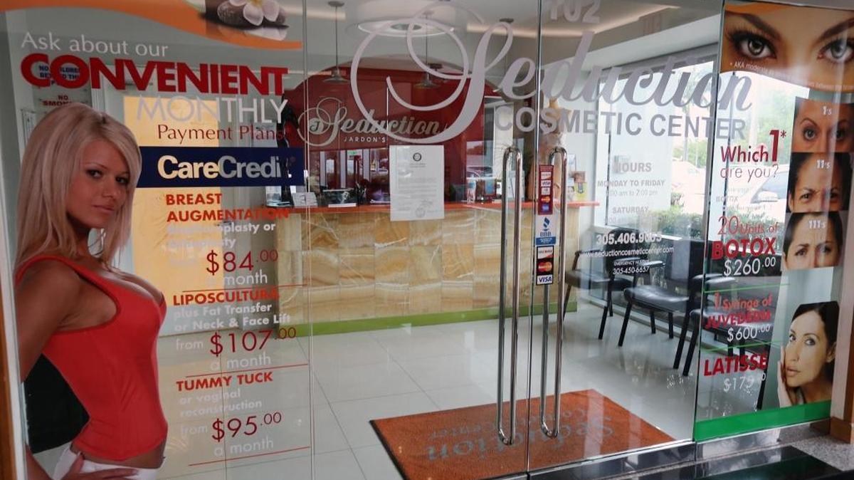 The entrance to Seduction by Jardons Medical Center in Doral pictured on Friday, June 2, one day after the death of Lattia Baumeister, 30, of Illinois, who had a cosmetic procedure at the clinic with Osakatukei “Osak” Omulepu. According to police, Omulepu was performing an unidentified surgery on Baumeister when she stopped breathing. She was taken to Kendall Regional Medical Center, where she died. Omulepu is fighting the state’s effort to revoke his medical license on the grounds of repeated medical malpractice.