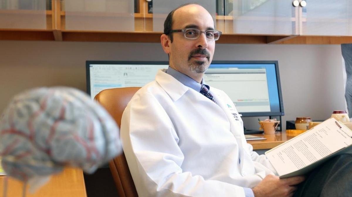 Dr. Marc E. Agronin, an expert in Alzheimer’s, dementia and other memory disorders, at his office in Miami Jewish Health Systems.