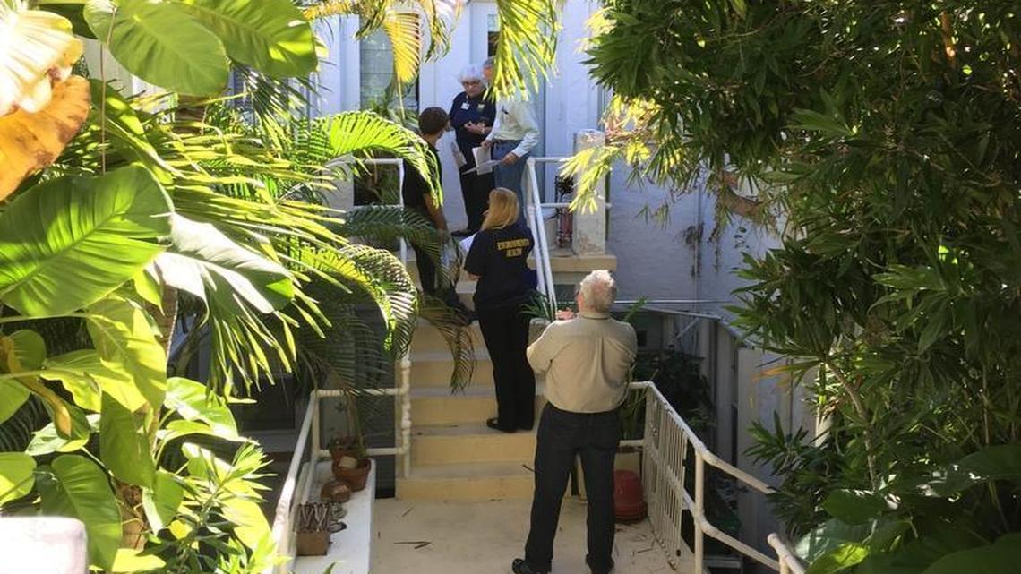 Florida Department of Health workers visit 1236 Drexel Ave. in Miami Beach early Wednesday to inform residents that traps captured mosquitoes carrying Zika virus at that location.