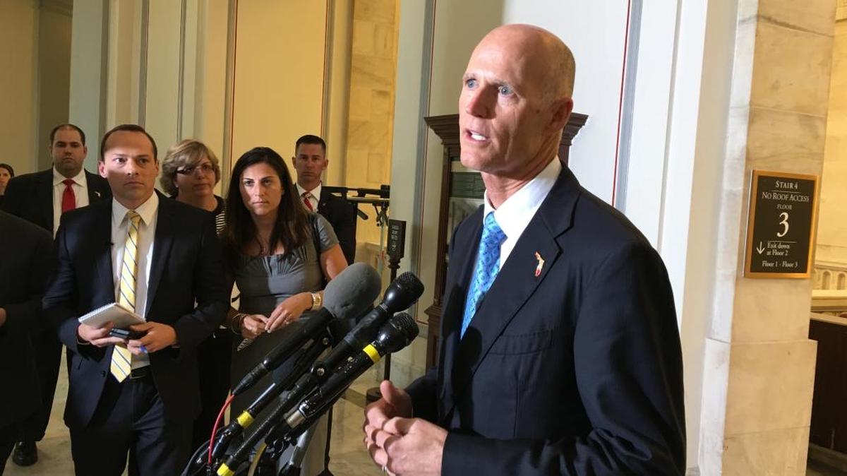 Gov. Rick Scott addresses members of the media in Washington, D.C., after lobbying members of Florida’s Congressional delegation to support federal funding for the Zika virus crisis.